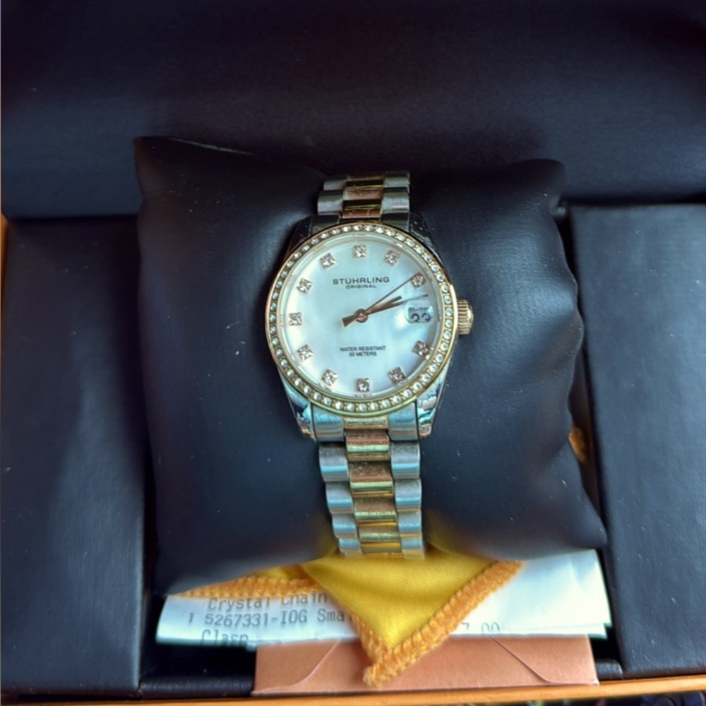 NIB w/tag. Stuhrling Ladies Watch.